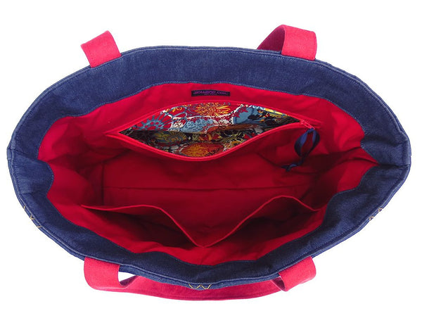 interior of the anjelica tote bag, with red twill lining and three large pockets