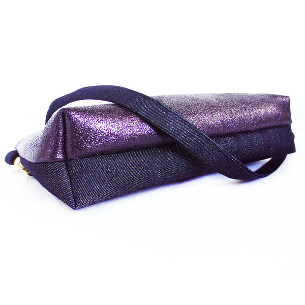 the bottom of the crossbody bag is 2.5" deep