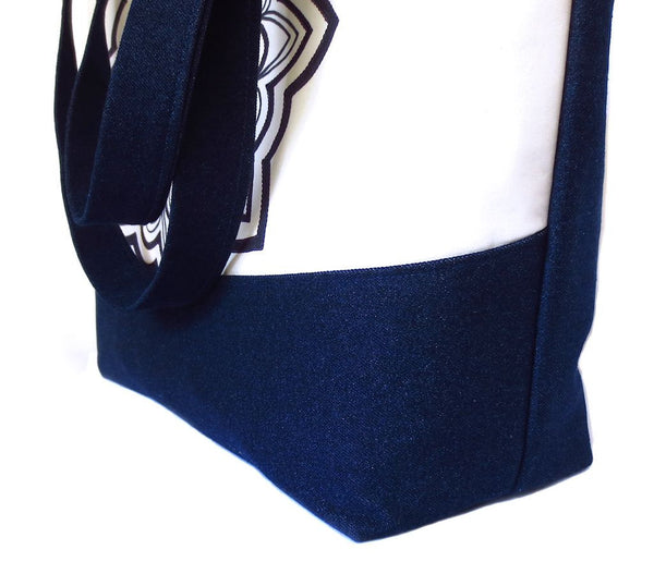 side view of the gloria tote, showing the 6" deep gussets