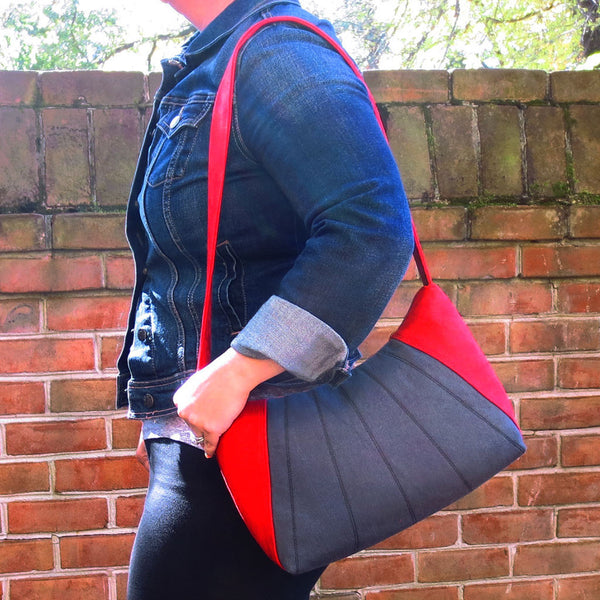 the everyday bag from Holland Cox hangs comfortably from the shoulder in a 16" drop, as shown on a model