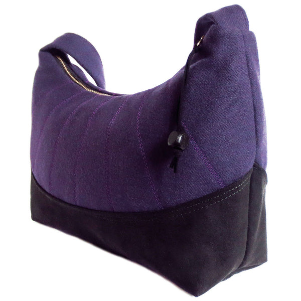 the back of the simone handbag is identical to the front