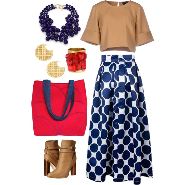 a statement bag from Holland Cox with statement jewelry