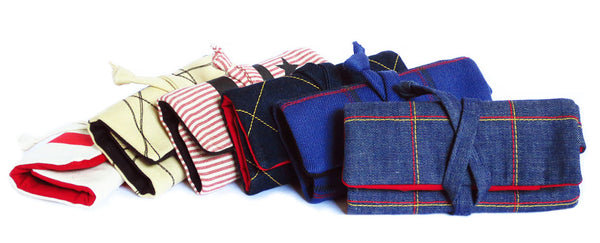 six new watch rolls in denim, twill, and canvas from Holland Cox